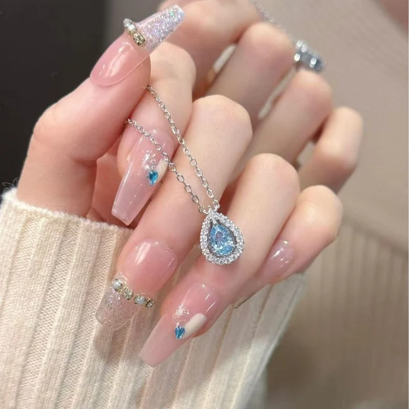 ✨ Elegantes pendientes con borlas en forma de corazón-ES