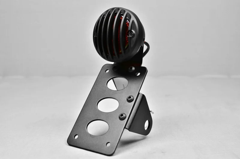 Soporte de matrícula lateral con luces