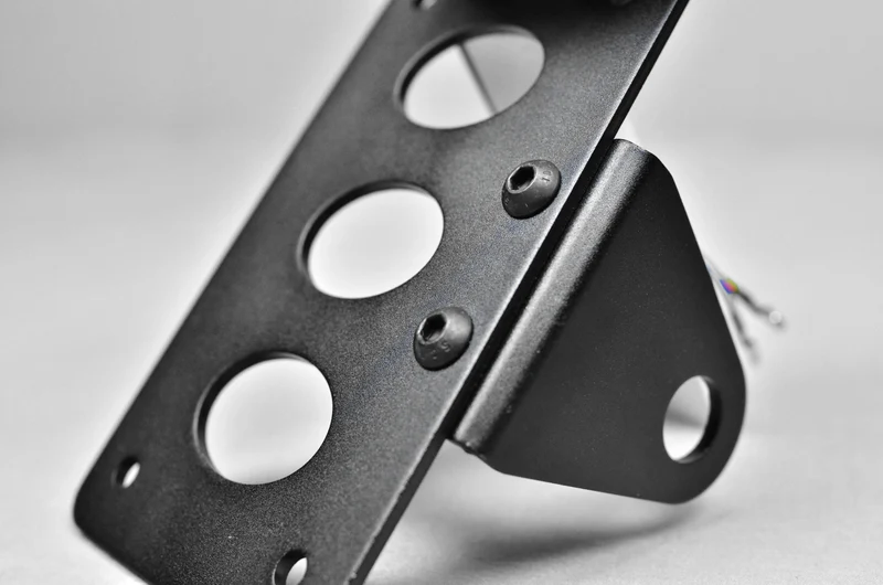 Soporte de matrícula lateral con luces